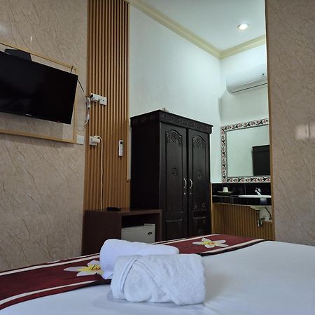 Frangipani Homestay Нуса-Дуа Экстерьер фото