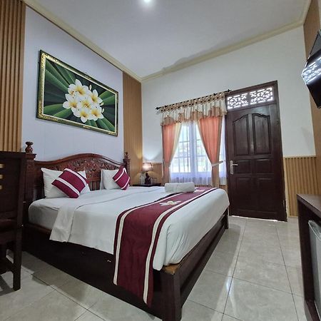 Frangipani Homestay Нуса-Дуа Экстерьер фото