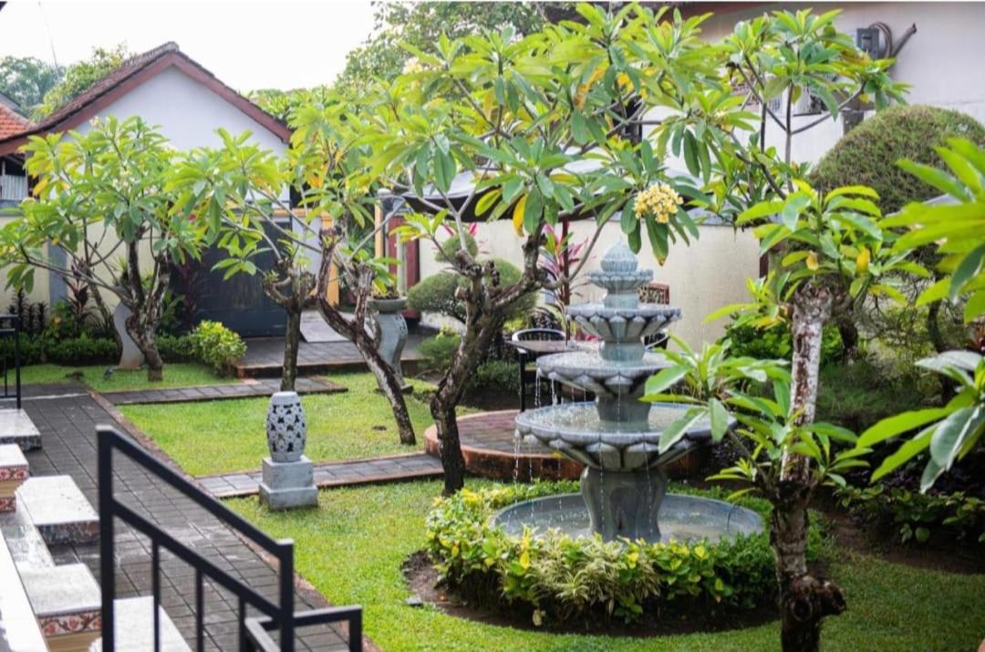 Frangipani Homestay Нуса-Дуа Экстерьер фото