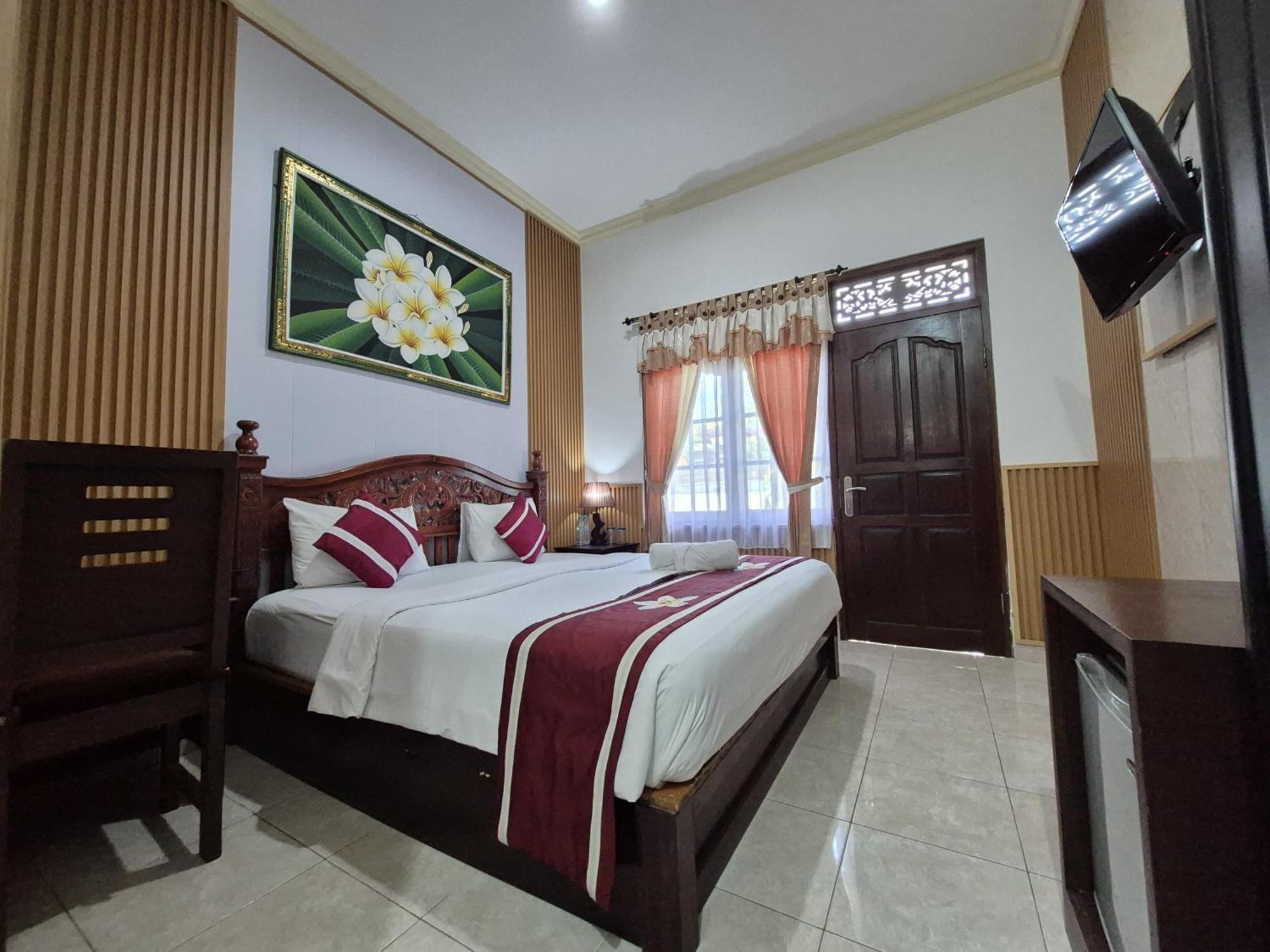 Frangipani Homestay Нуса-Дуа Экстерьер фото