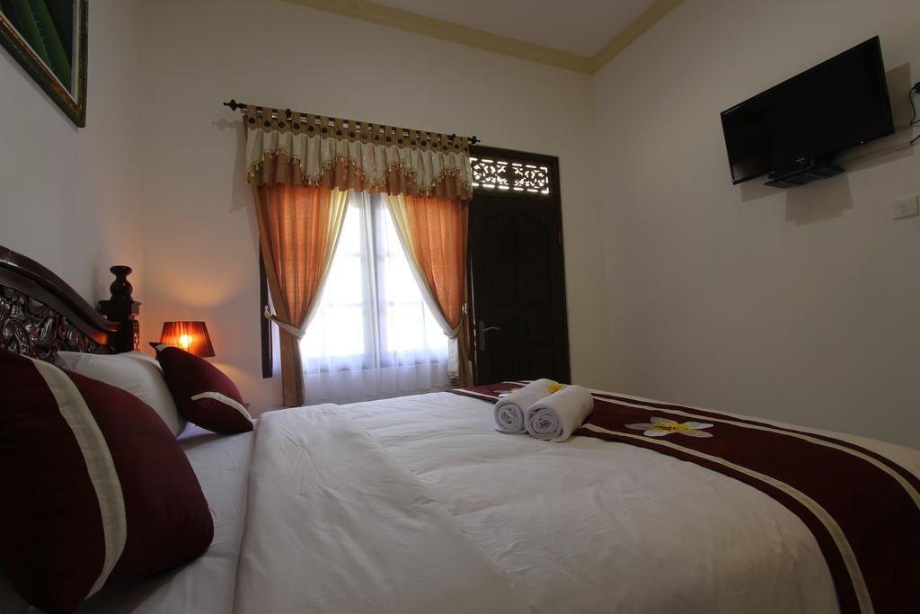 Frangipani Homestay Нуса-Дуа Экстерьер фото