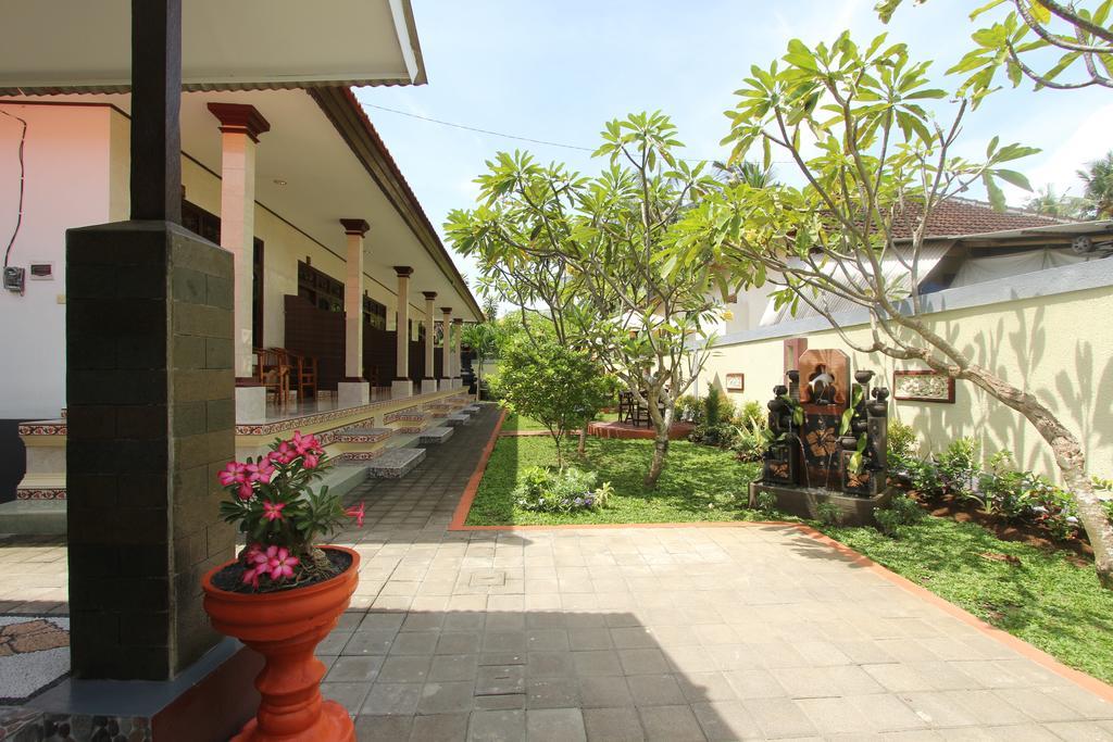 Frangipani Homestay Нуса-Дуа Экстерьер фото