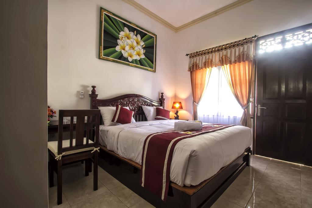 Frangipani Homestay Нуса-Дуа Номер фото