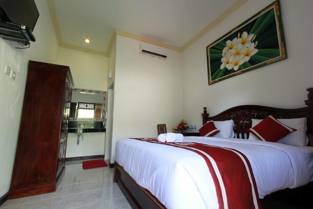 Frangipani Homestay Нуса-Дуа Экстерьер фото