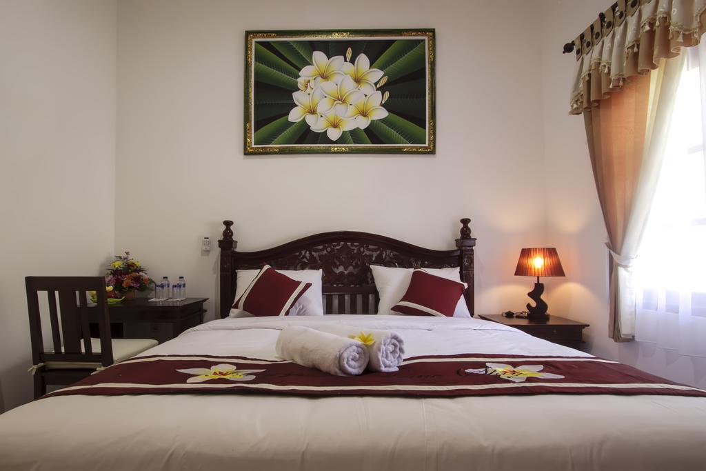 Frangipani Homestay Нуса-Дуа Номер фото